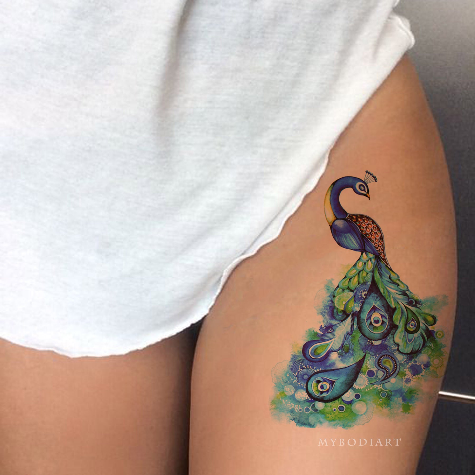 Tattoo by Andrey Barkov | Peacock tattoo, Hip tattoos women, Tattoos